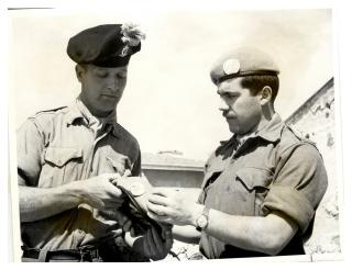 Exchanging caubeen for blue beret United Nations