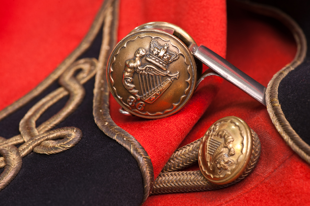 Whistle made from two brass buttons